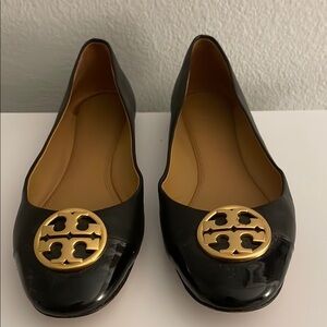 Tory Burch Black and Gold Flats